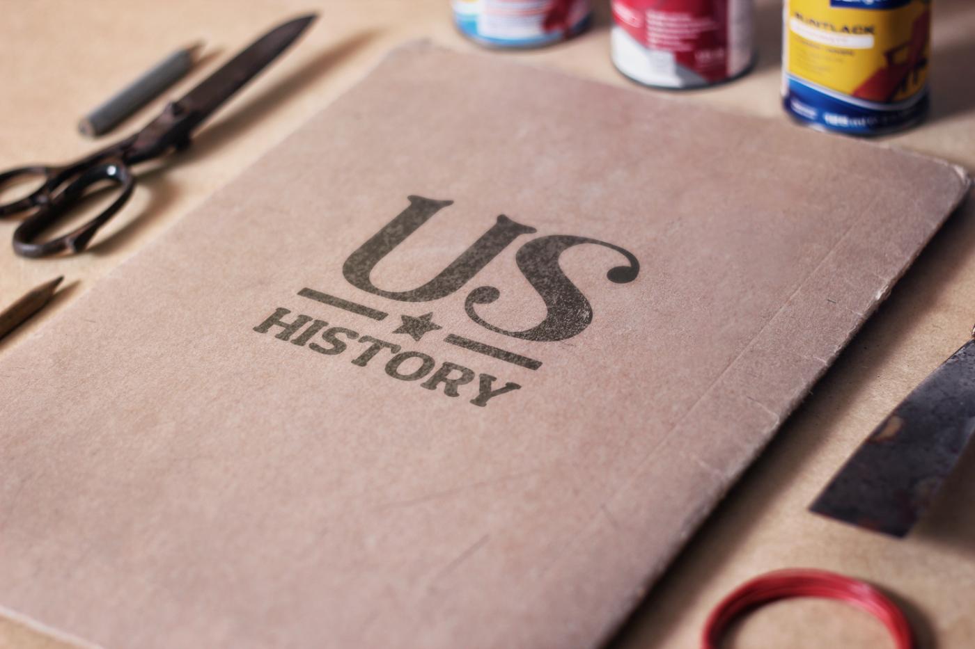 The US History mark stamped on a paper folder